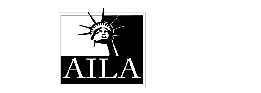 Black and white logo featuring the Statue of Liberty's head and crown above the text "AILA" in bold capital letters.